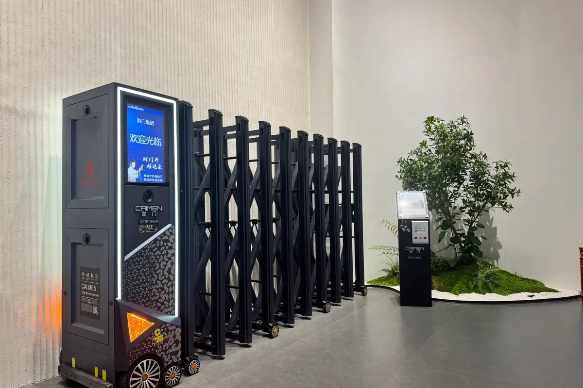 CAIMEN retractable gate in a compact folded position in the showroom.