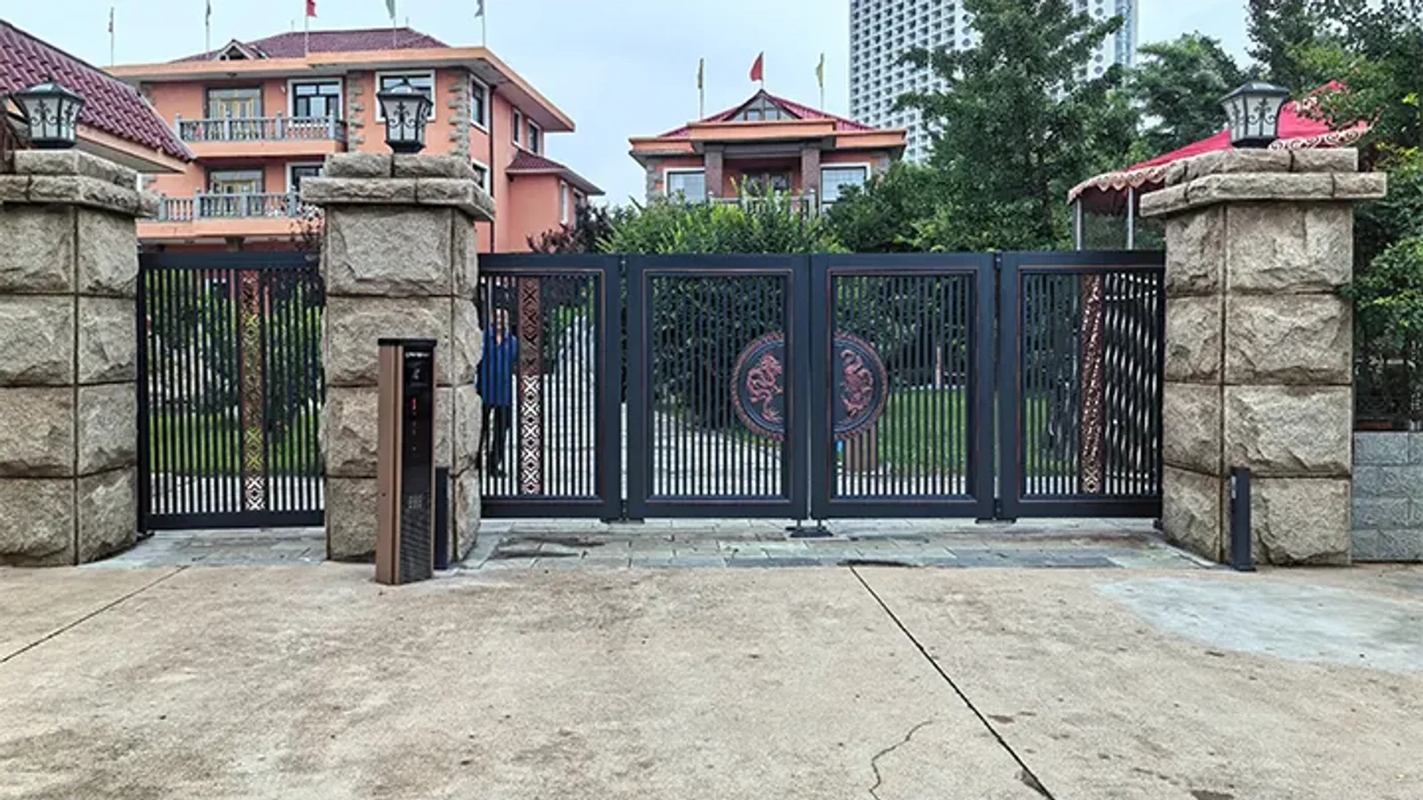 Aluminum swing gate at a villa driveway