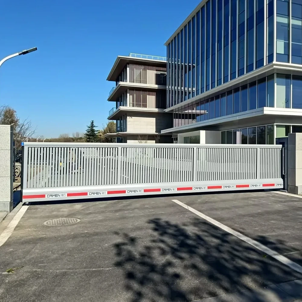 CAIMEN aluminum cantilever sliding gate at a commercial vehicle entrance